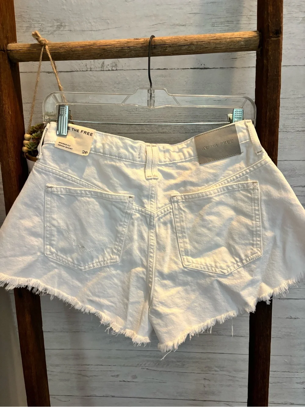 Free People white denim shorts